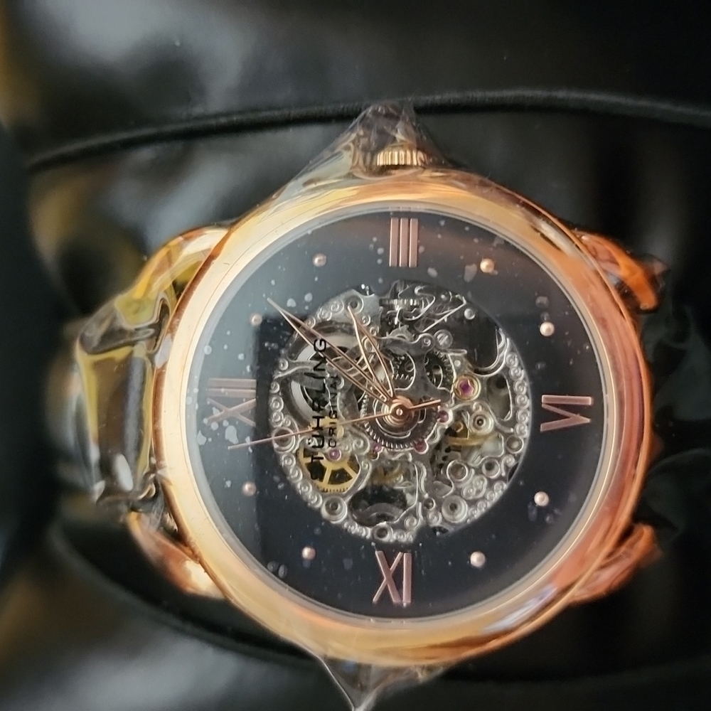 Stuhrling Original Rose Gold Skeleton Dial Women's Watch with Black Face